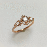 Vintage-Inspired Rose Gold Three stone Diamond Halo Ring