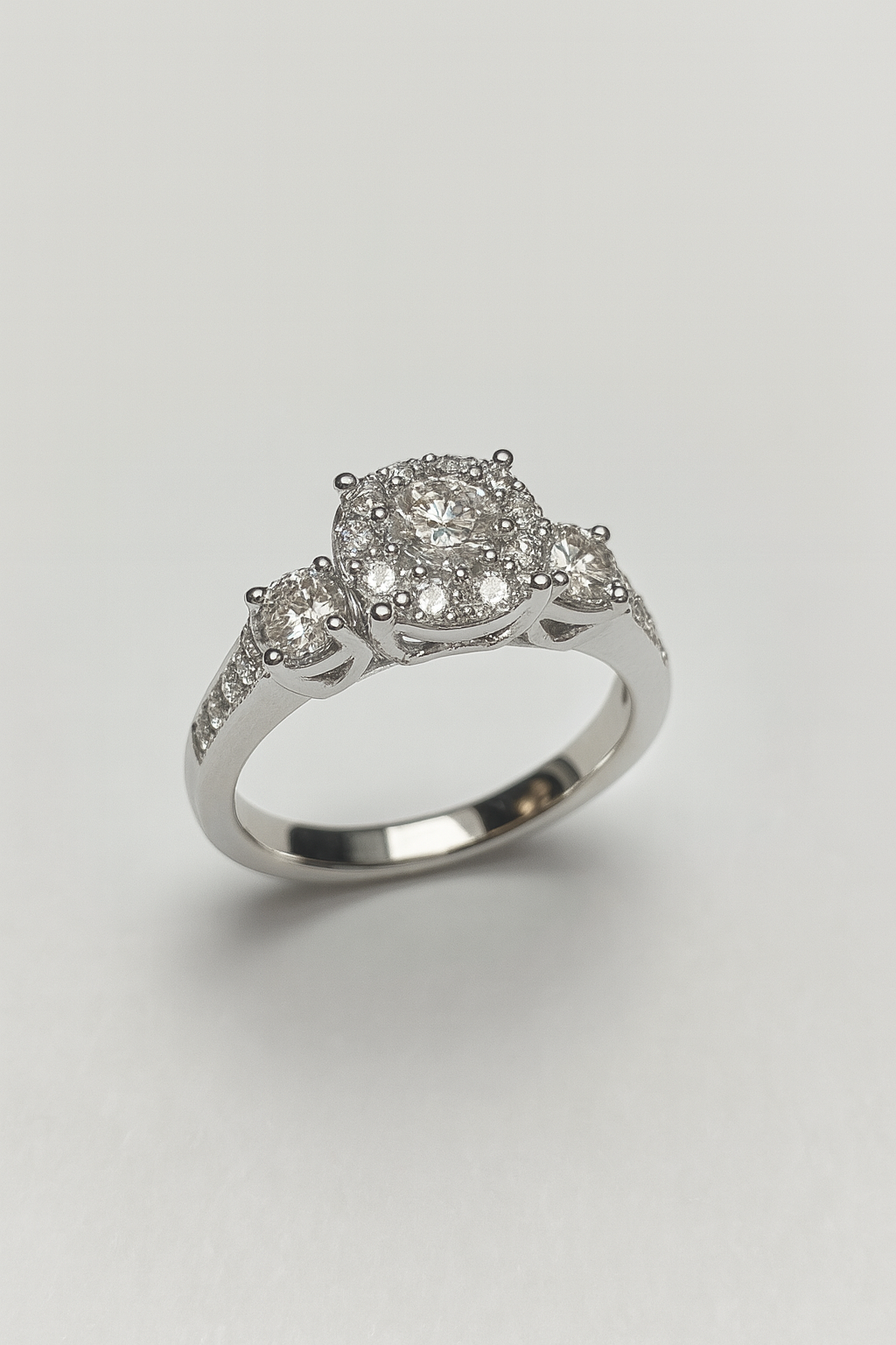 Classic Three-Stone Halo Diamond Engagement Ring in 14K White Gold